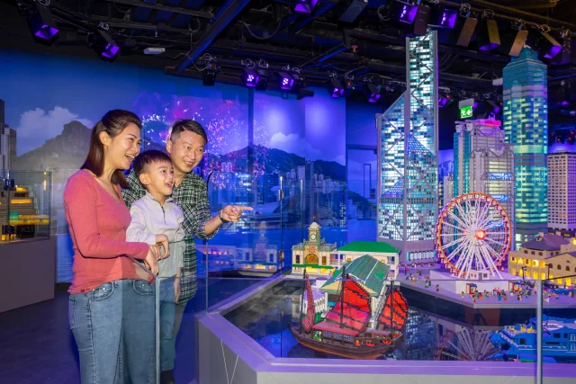 A family exploring the miniature Hong Kong skyline at LEGOLAND Discovery Centre